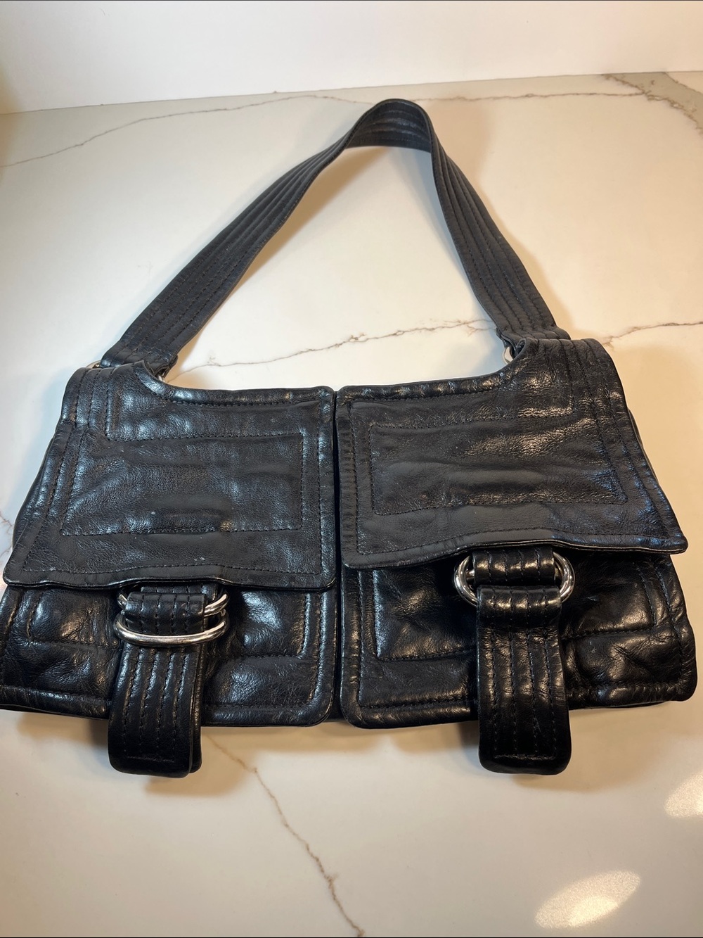 Kooba Black Leather Shoulder Bag with Silver Logo Plate. 2 Front Pockets